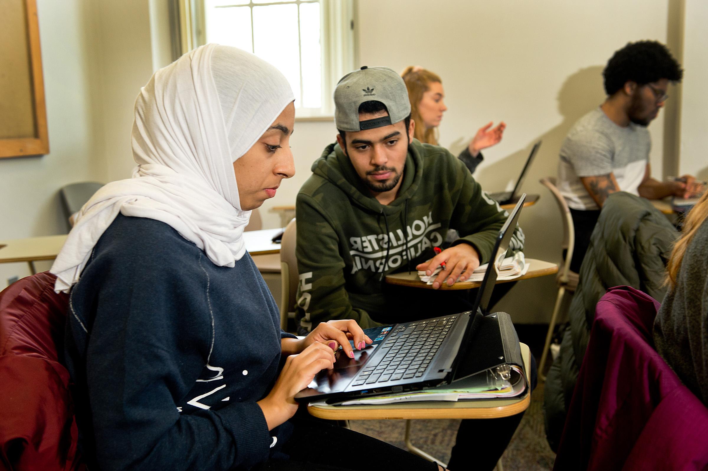 students sitting in class interacting